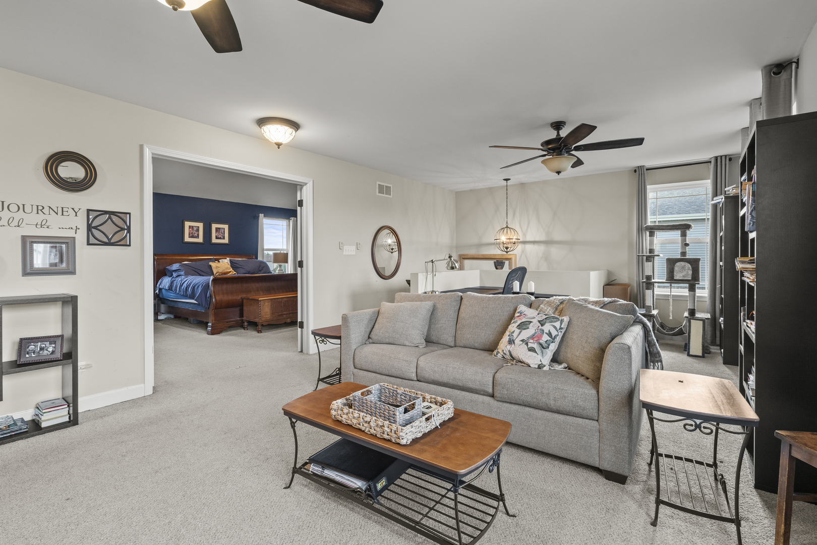 15711 Mueller Way Lockport, IL 60441 - Photo 14 of 37 a living room with furniture a ceiling fan and a window