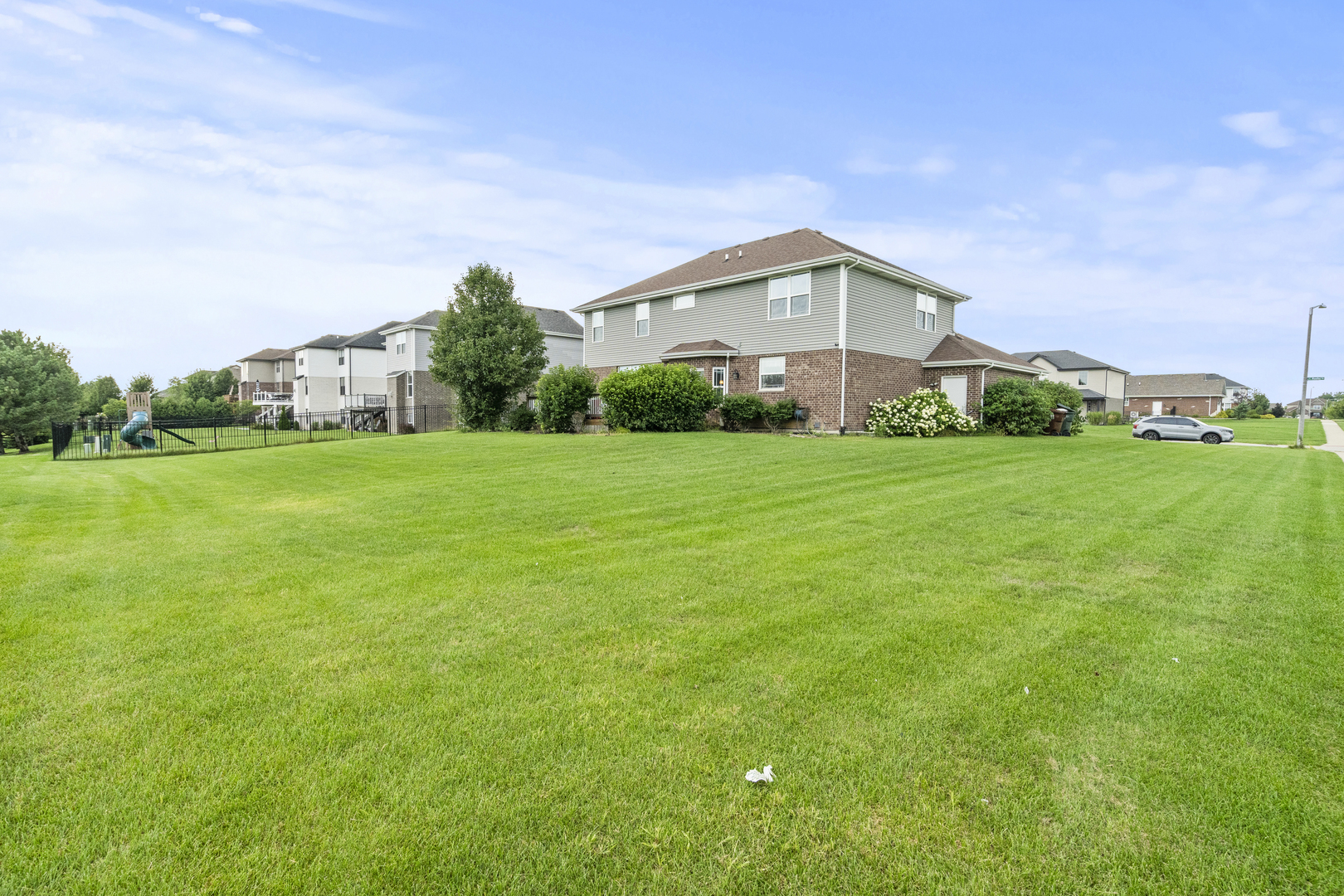 15711 Mueller Way Lockport, IL 60441 - Photo 25 of 37 a front view of a house with a yard