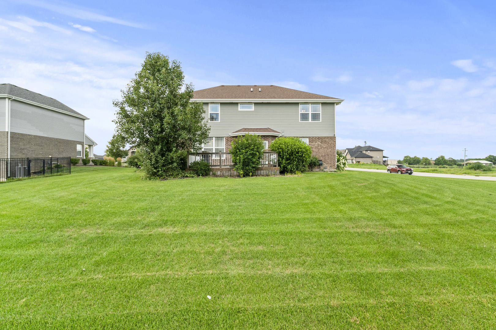 15711 Mueller Way Lockport, IL 60441 - Photo 26 of 37 a front view of a house with a yard