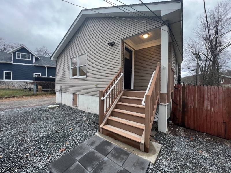 18 West River Styx Road, Unit 3 Hopatcong, NJ 07843 - Photo 1 of 9 a view of a house with a yard
