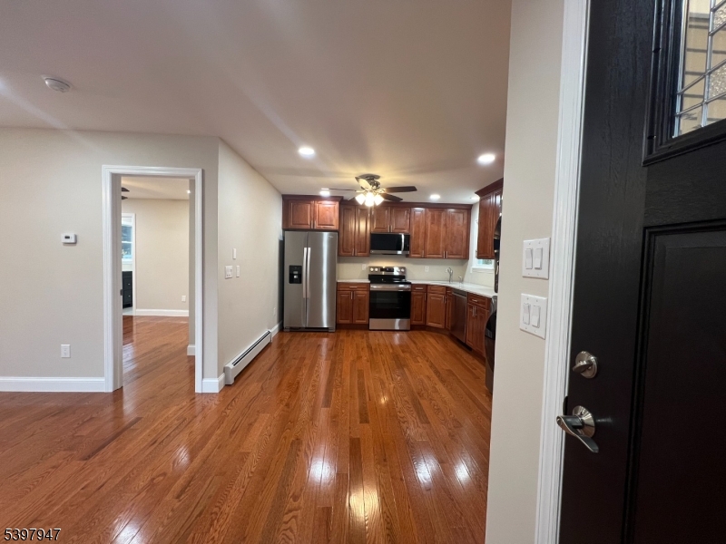 18 West River Styx Road, Unit 3 Hopatcong, NJ 07843 - Photo 2 of 9 a view of a kitchen and wooden floor
