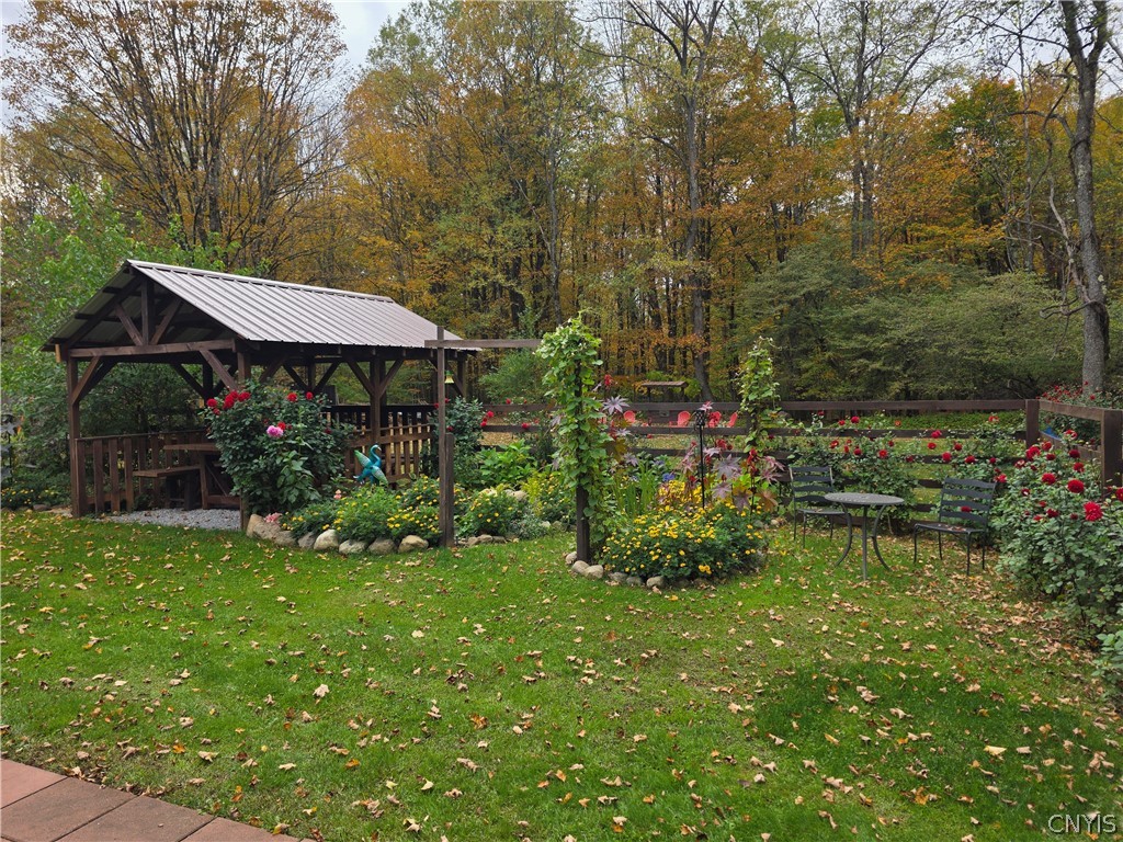 1053 Grant Road Russia, NY 13324 - Photo 38 of 47 Lush landscaping and a covered wooden pavilion cre