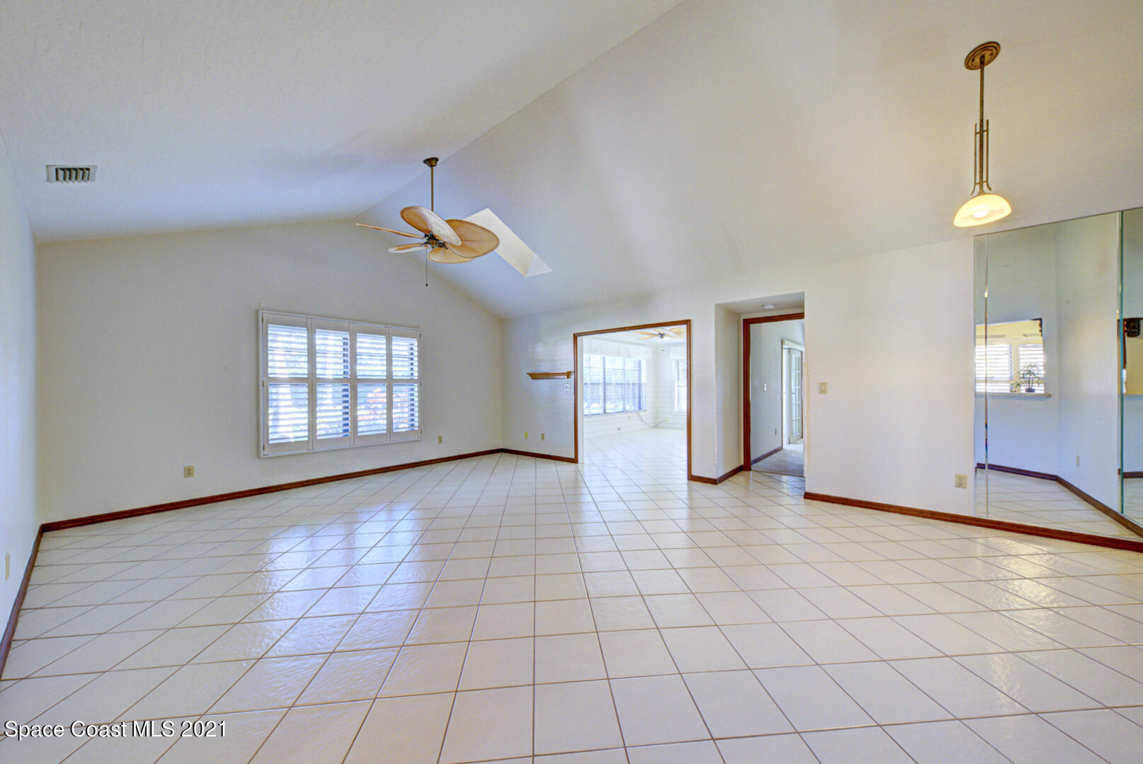809 Ridge Lake Drive Melbourne, FL 32940 - Photo 14 of 27 Dining room and living room