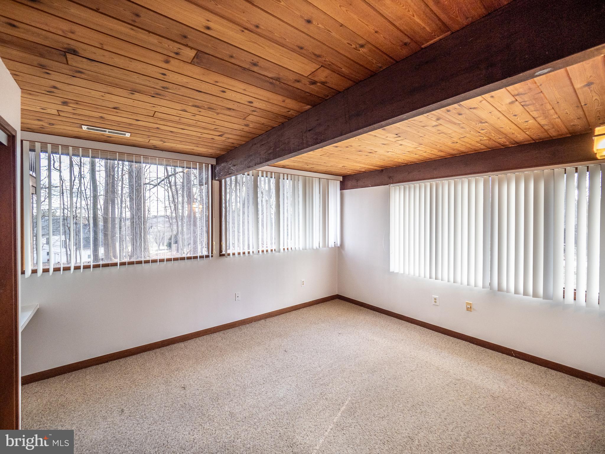 14805 Mockingbird Drive Darnestown, MD 20874 - Photo 30 of 35 a view of an empty room with a window