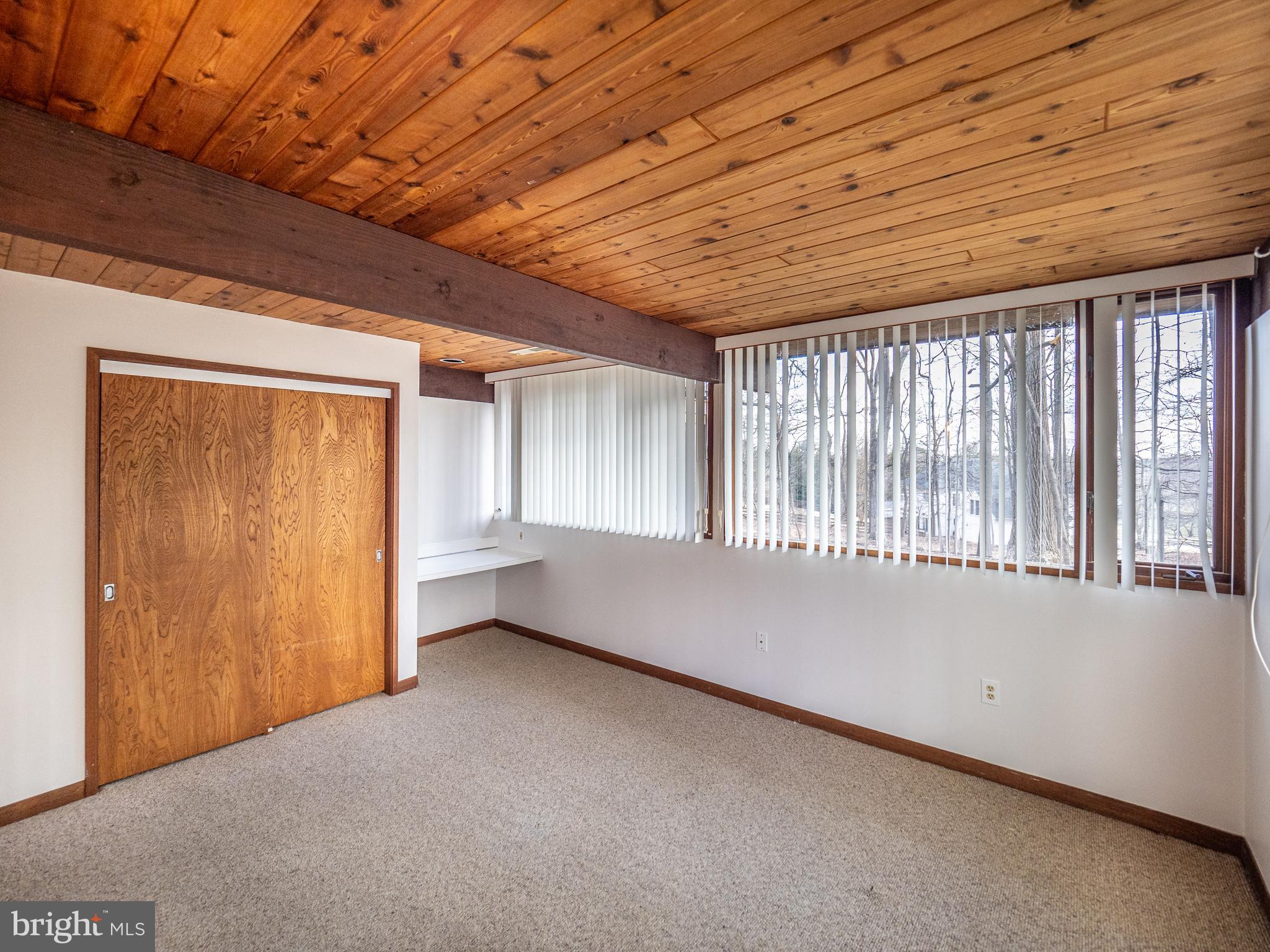 14805 Mockingbird Drive Darnestown, MD 20874 - Photo 31 of 35 a view of an empty room with a window