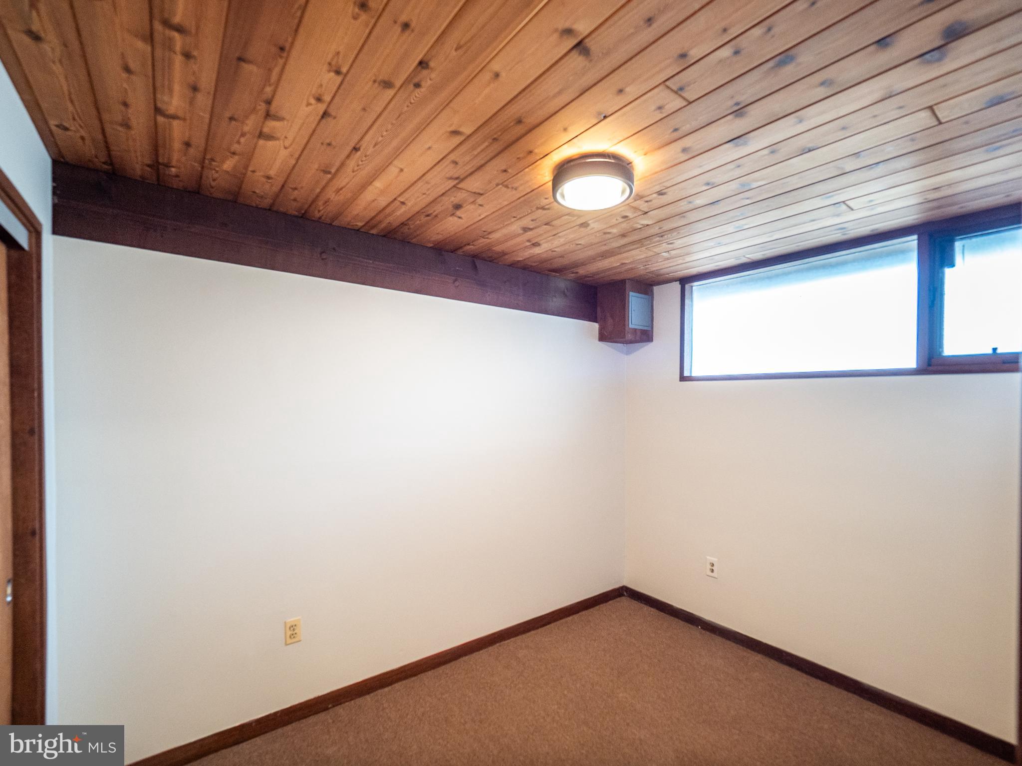 14805 Mockingbird Drive Darnestown, MD 20874 - Photo 34 of 35 a view of empty room with windows