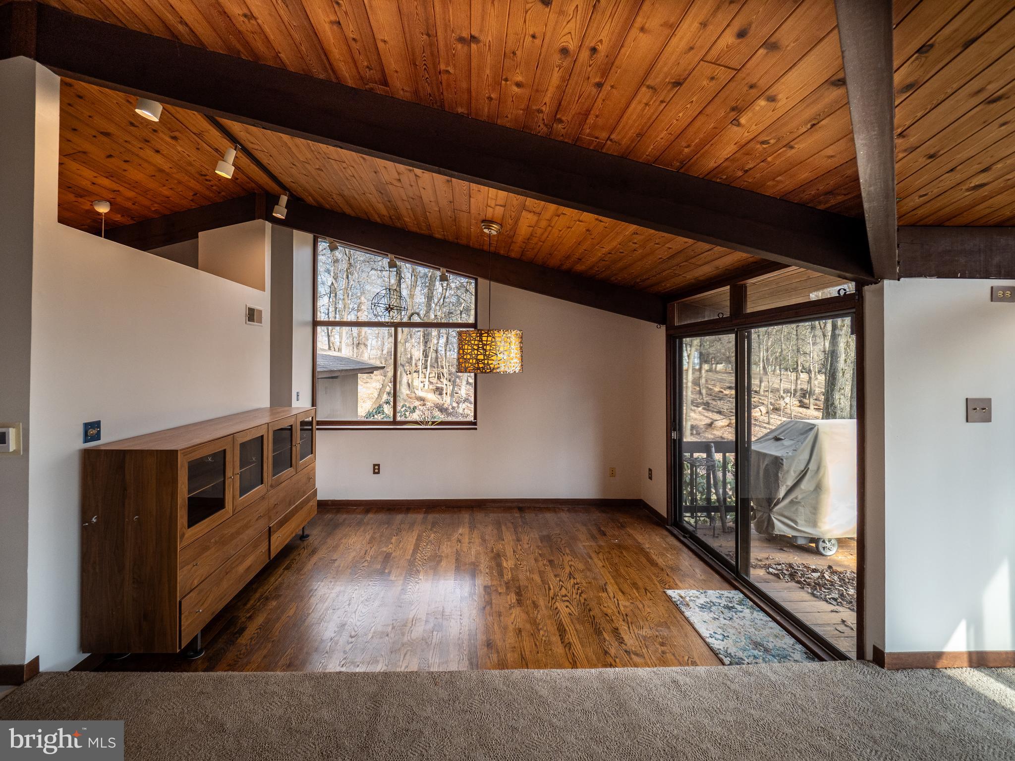 14805 Mockingbird Drive Darnestown, MD 20874 - Photo 9 of 35 a view of an empty room with a window