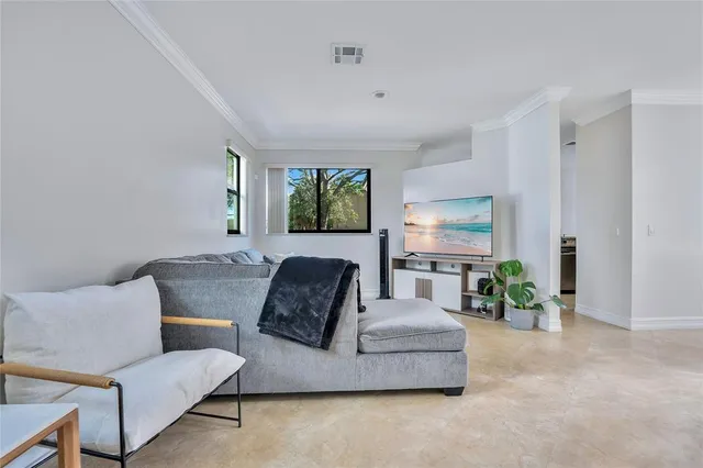 a living room with furniture and a couch