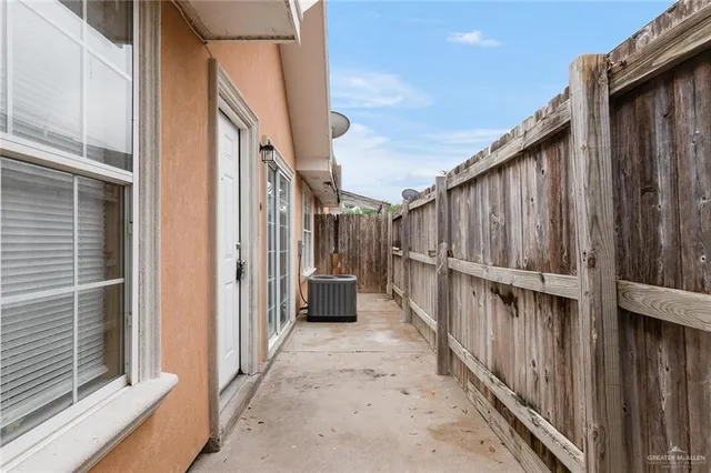 a view of a house with wooden stairs