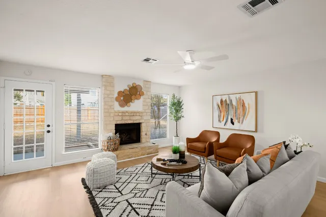 a living room with furniture and a window