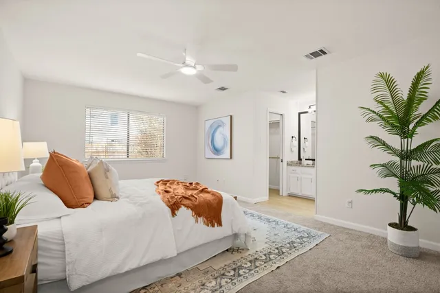 a view of entryway livingroom and hall with wooden floor