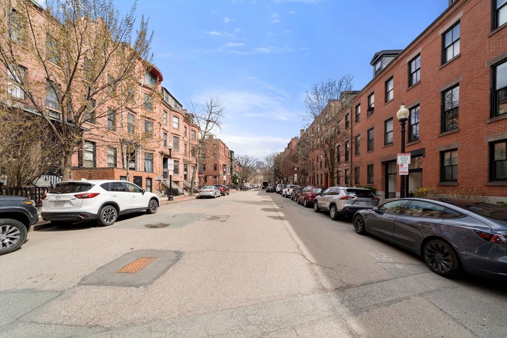290 Shawmut Avenue, Unit 4 Boston, MA 02118 - Photo 28 of 28 a view of a cars parked in front of a building