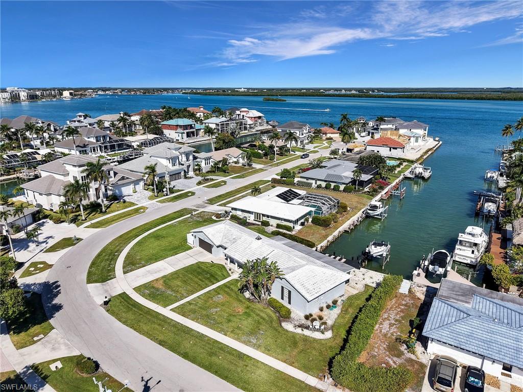 945 Sundrop Court Marco Island, FL 34145 - Photo 2 of 31 an aerial view of a house with a ocean view