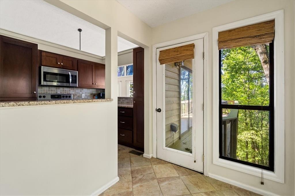 157 Sunrise Terrace Jasper, GA 30143 - Photo 16 of 54 a kitchen with stainless steel appliances a refrigerator and a sink