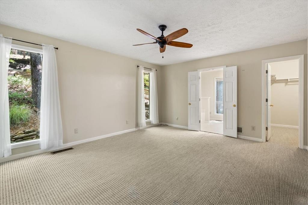 157 Sunrise Terrace Jasper, GA 30143 - Photo 19 of 54 a view of empty room with ceiling fan