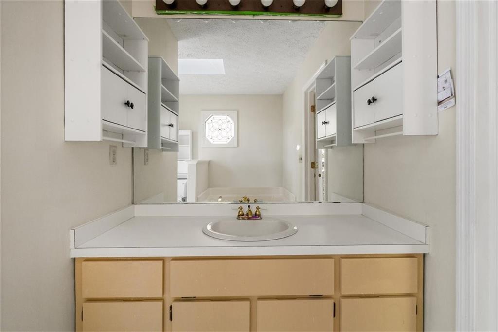 157 Sunrise Terrace Jasper, GA 30143 - Photo 23 of 54 a bathroom with a sink and a mirror