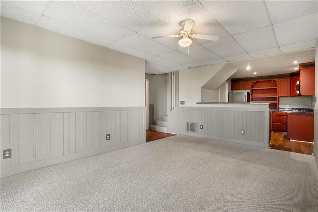 157 Sunrise Terrace Jasper, GA 30143 - Photo 29 of 54 an empty room with chandelier and windows