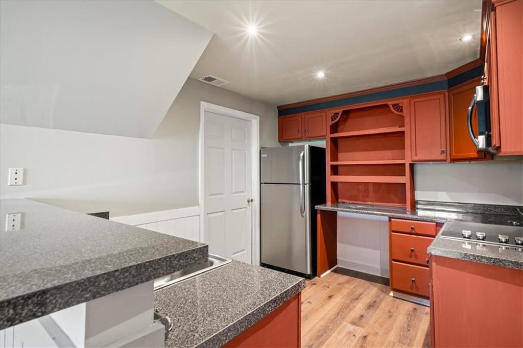 157 Sunrise Terrace Jasper, GA 30143 - Photo 30 of 54 a kitchen with stainless steel appliances granite countertop a refrigerator and a stove