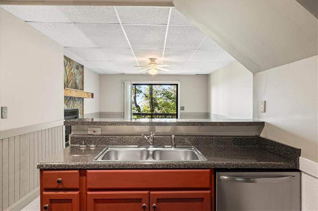 157 Sunrise Terrace Jasper, GA 30143 - Photo 31 of 54 a kitchen with a sink a counter space and cabinets