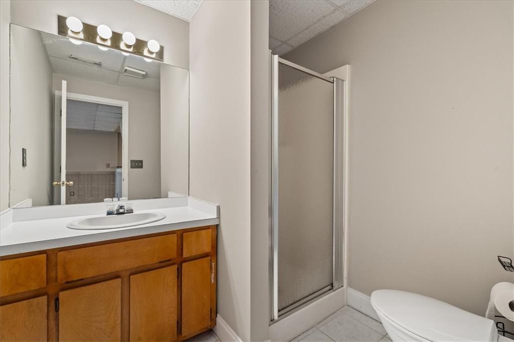 157 Sunrise Terrace Jasper, GA 30143 - Photo 35 of 54 a bathroom with a sink a toilet and shower