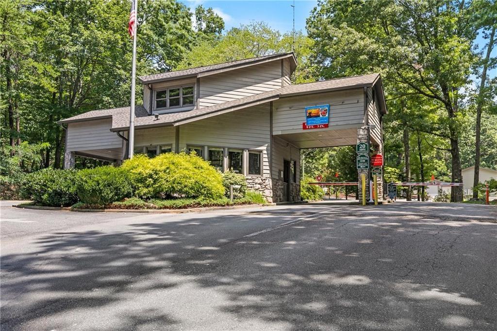 157 Sunrise Terrace Jasper, GA 30143 - Photo 41 of 54 a front view of a house with a yard and trees