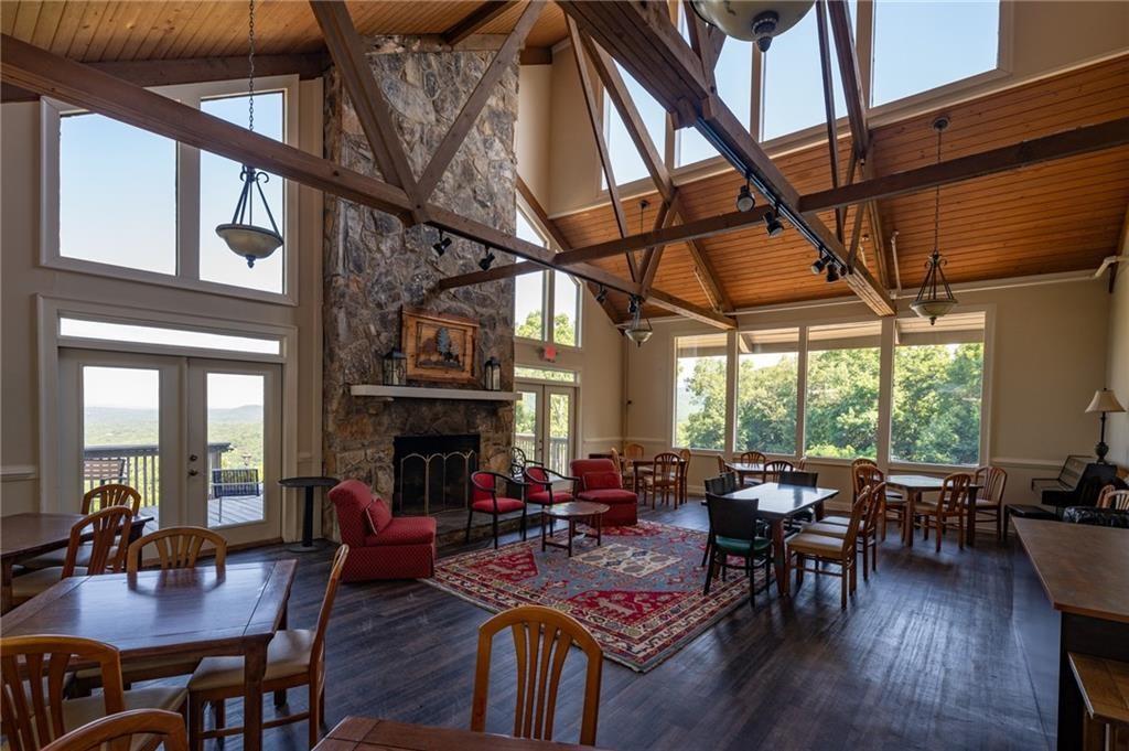 157 Sunrise Terrace Jasper, GA 30143 - Photo 51 of 54 a view of a dining room with furniture window and wooden floor