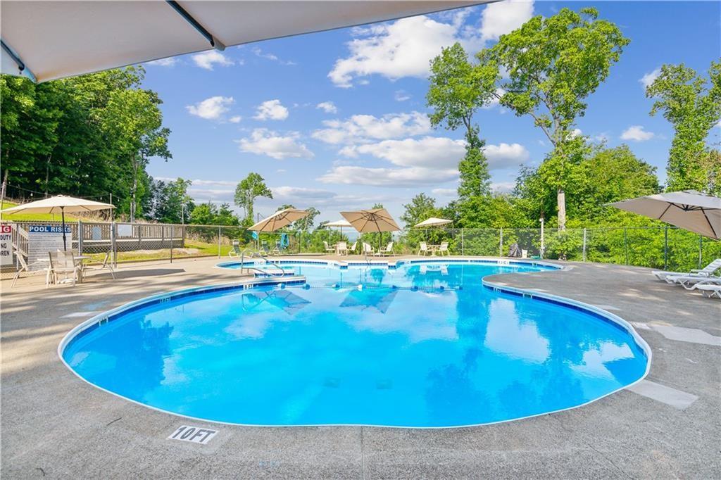 157 Sunrise Terrace Jasper, GA 30143 - Photo 52 of 54 a view of a swimming pool with an outdoor seating space