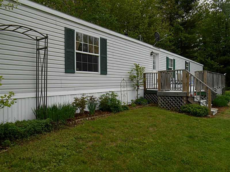 Exterior Front. Large sunny lot with...