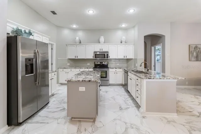 $674,900 | 9050 Callaway Drive, Trinity, FL 34655