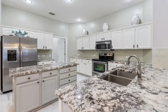 $674,900 | 9050 Callaway Drive, Trinity, FL 34655