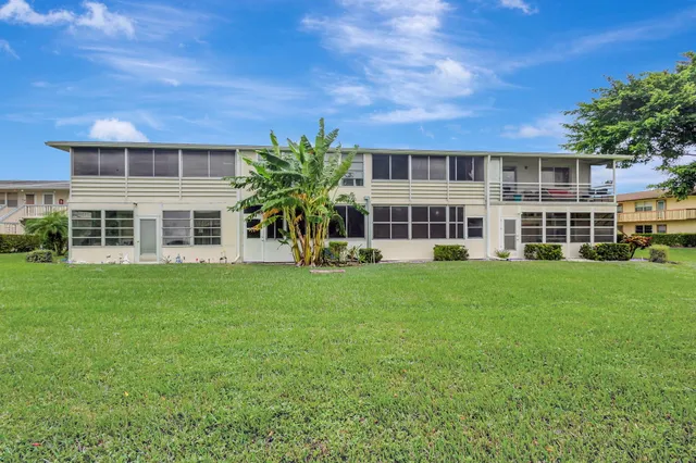 front view of a building with a yard