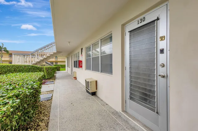 a view of a entrance door of the house
