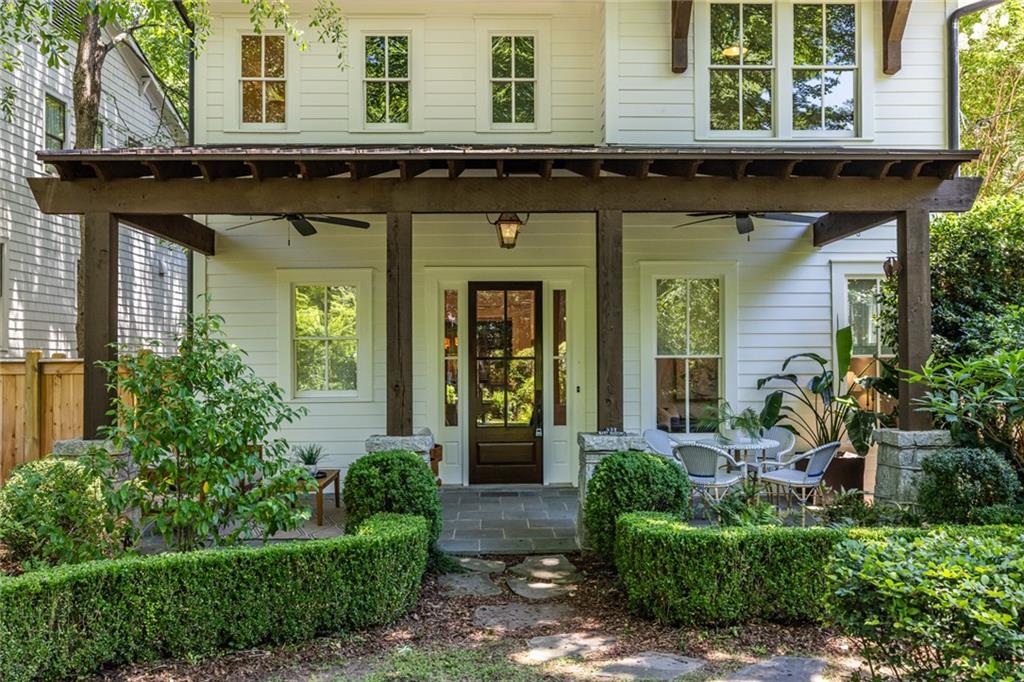 538 Ansley Street Decatur, GA 30030 - Photo 2 of 73 a front view of a house with a lots of potted plants
