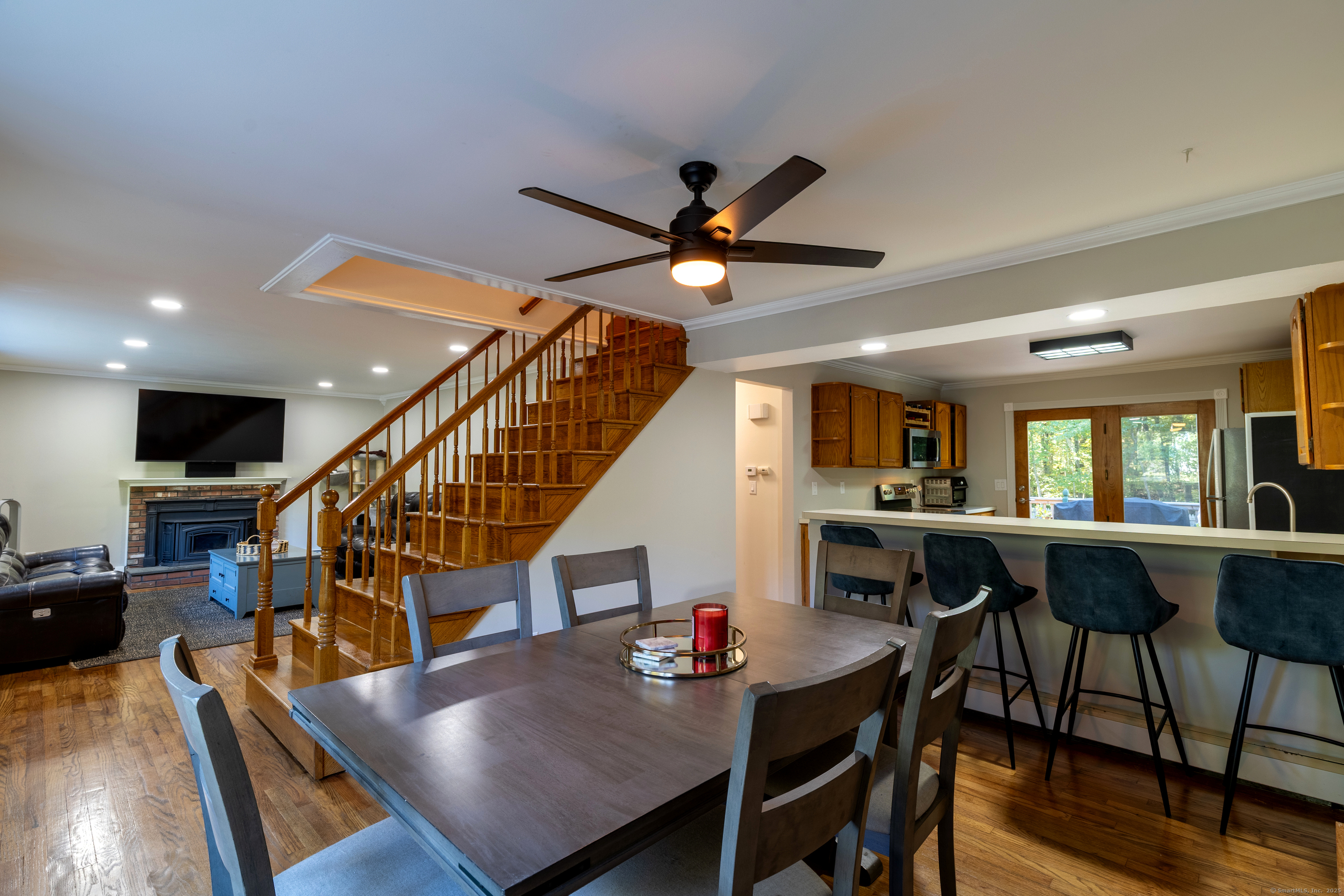 48 Quailcrest Road East Lyme, CT 06333 - Photo 11 of 31 a living room with furniture kitchen view and a large window