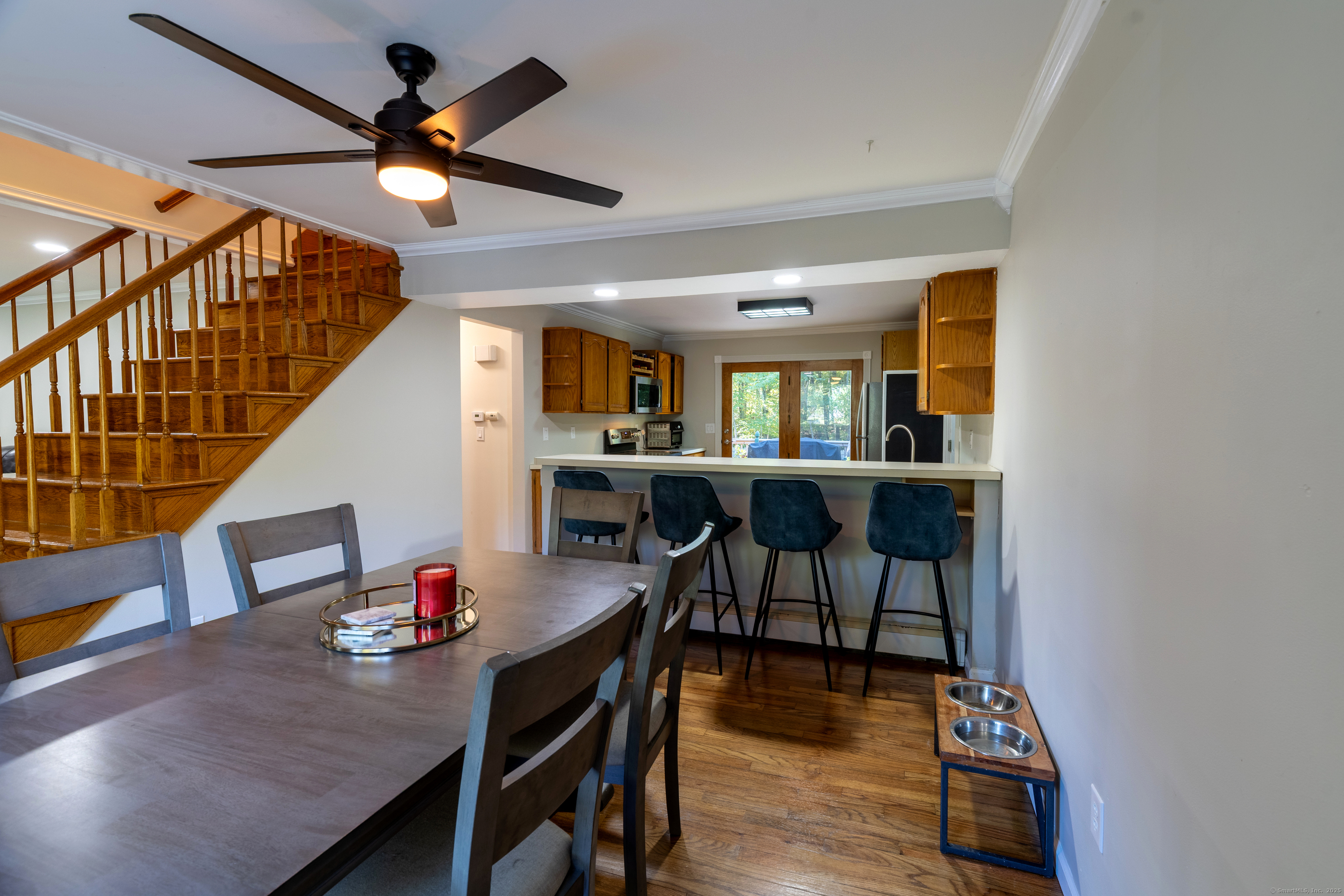 48 Quailcrest Road East Lyme, CT 06333 - Photo 12 of 31 a view of a dining room with furniture and wooden floor