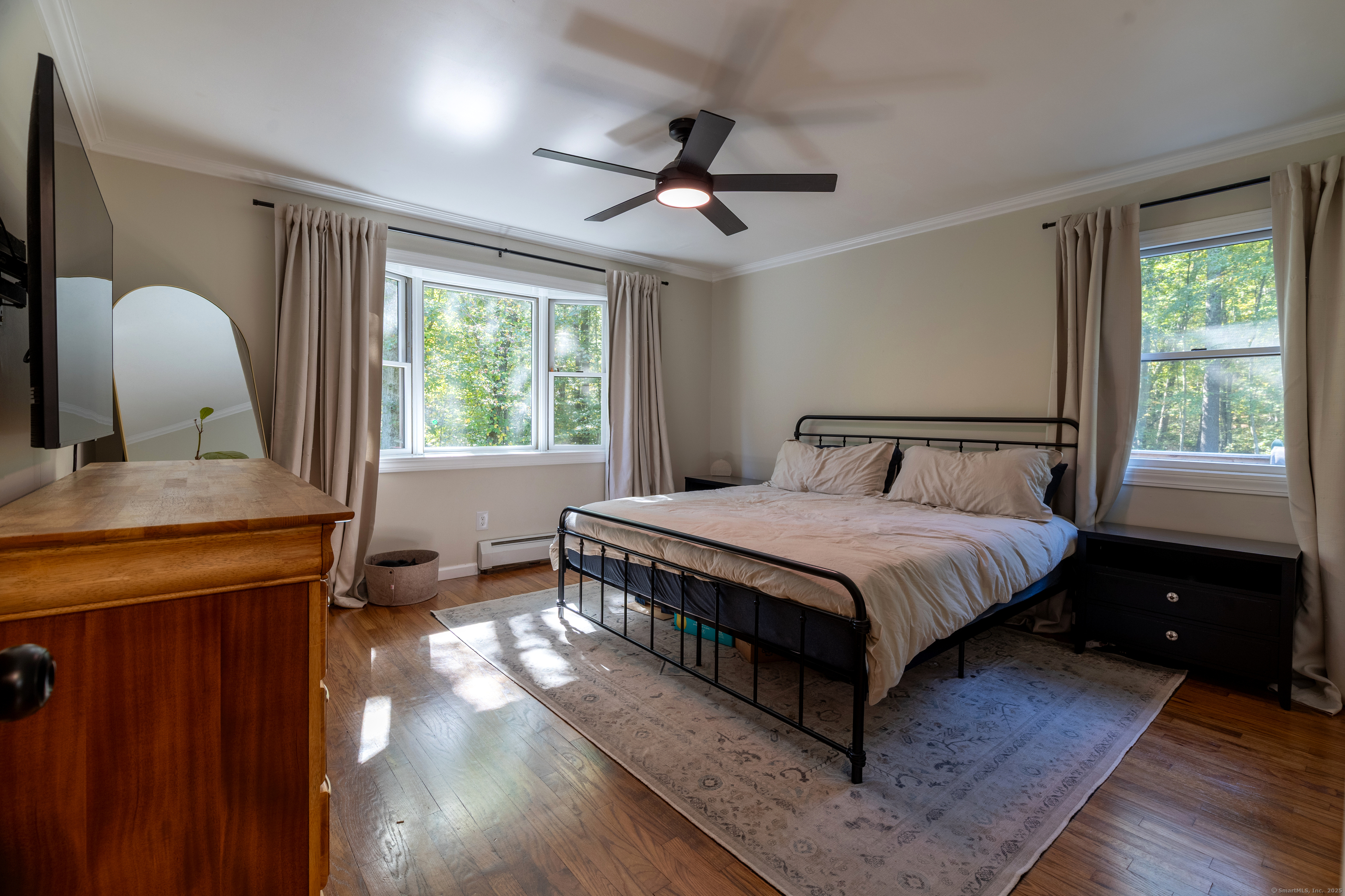 48 Quailcrest Road East Lyme, CT 06333 - Photo 16 of 31 a bedroom with a large bed and a window