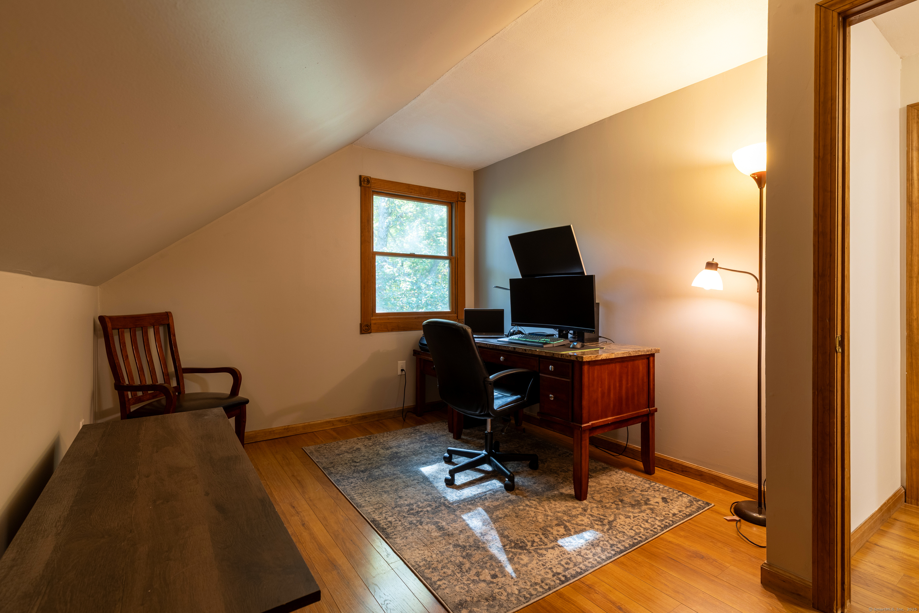 48 Quailcrest Road East Lyme, CT 06333 - Photo 22 of 31 a view of workspace with wooden floor windows