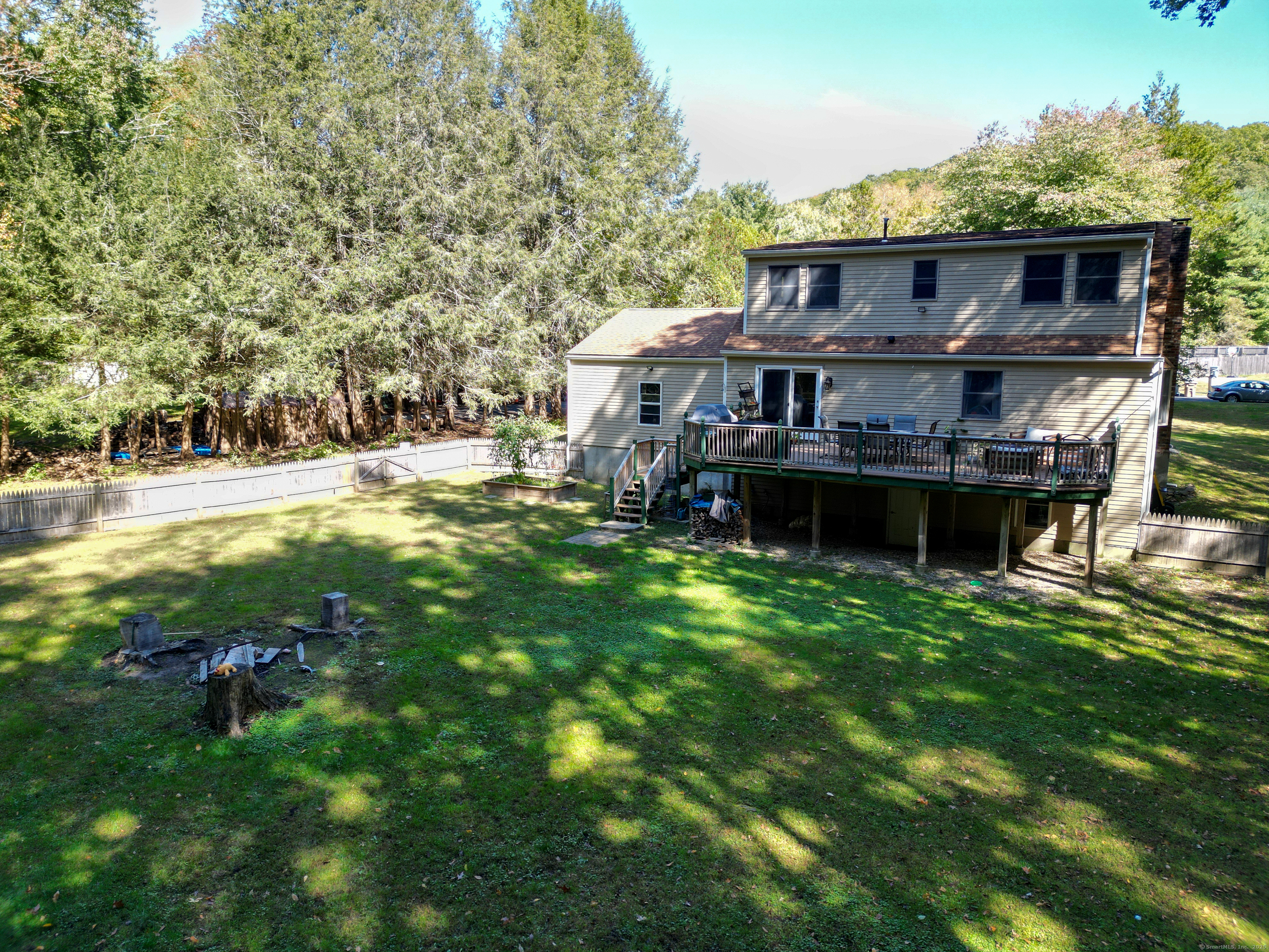 48 Quailcrest Road East Lyme, CT 06333 - Photo 6 of 31 a view of a house with a backyard