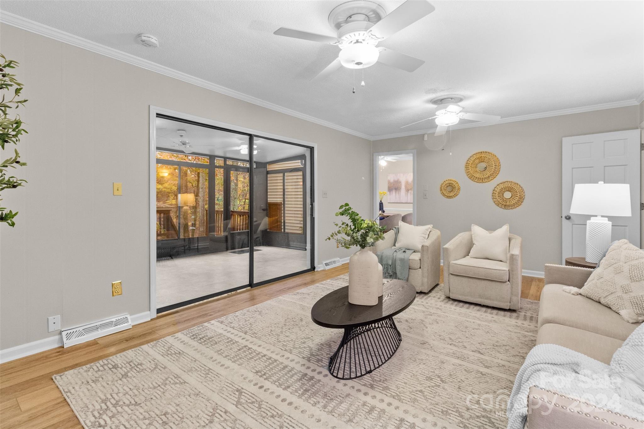 348 Beverly Circle Charlotte, NC 28270 - Photo 12 of 45 a living room with furniture potted plant and glass door
