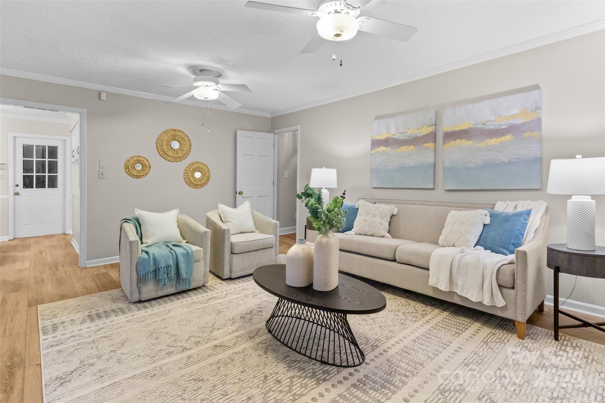 348 Beverly Circle Charlotte, NC 28270 - Photo 13 of 45 a living room with furniture and a chandelier