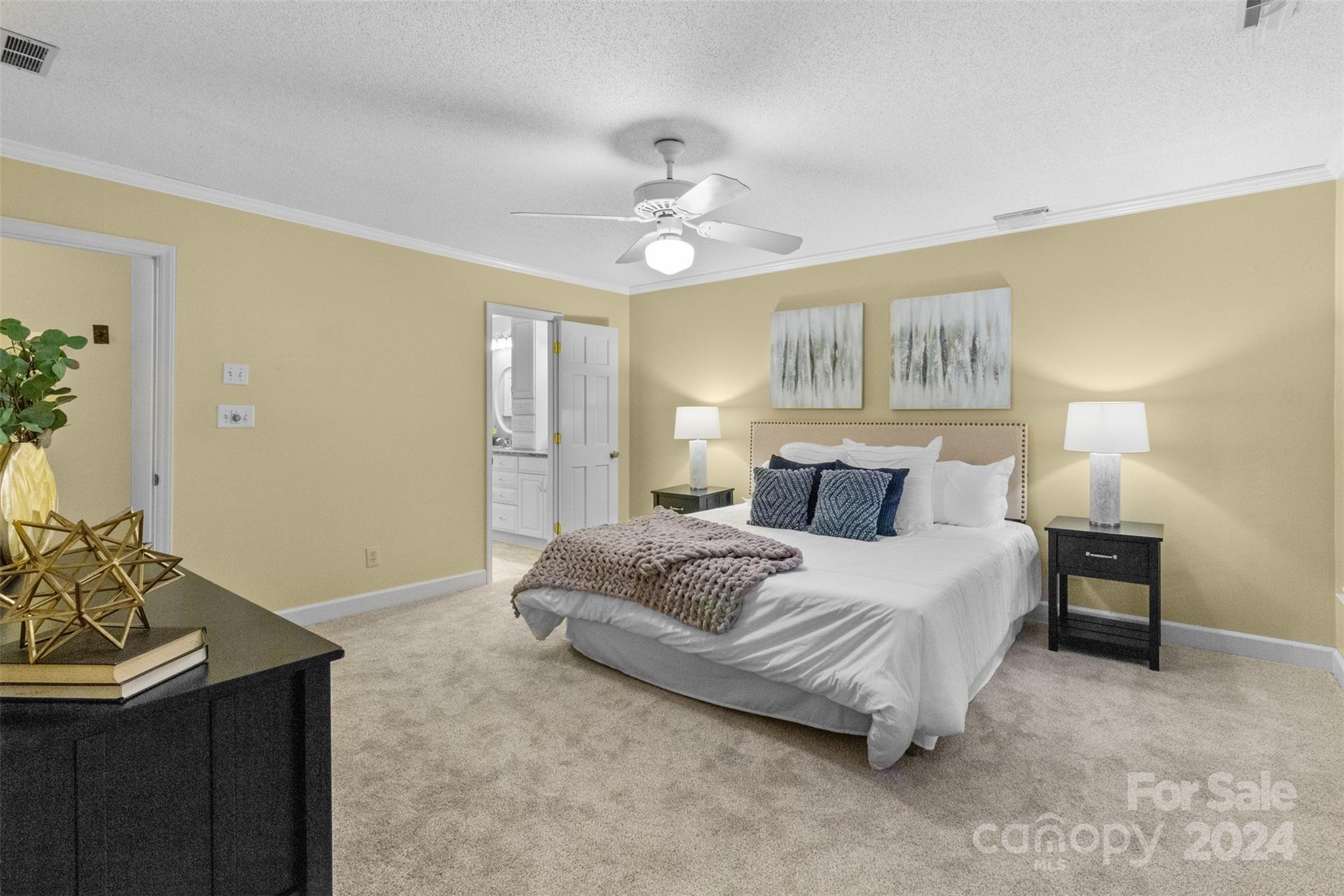 348 Beverly Circle Charlotte, NC 28270 - Photo 18 of 45 a spacious bedroom with a bed and dresser