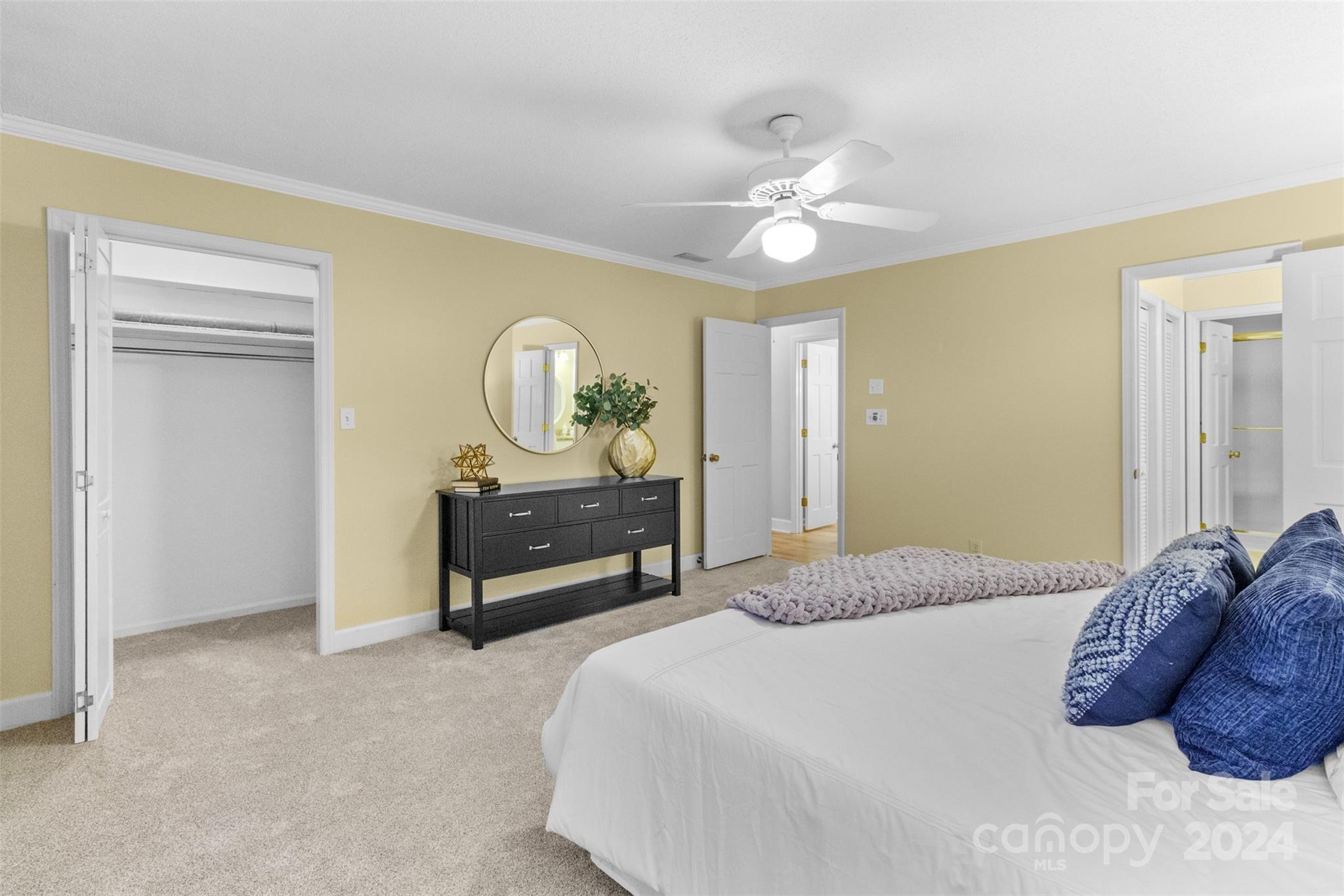 348 Beverly Circle Charlotte, NC 28270 - Photo 19 of 45 a bedroom with a bed and a chandelier