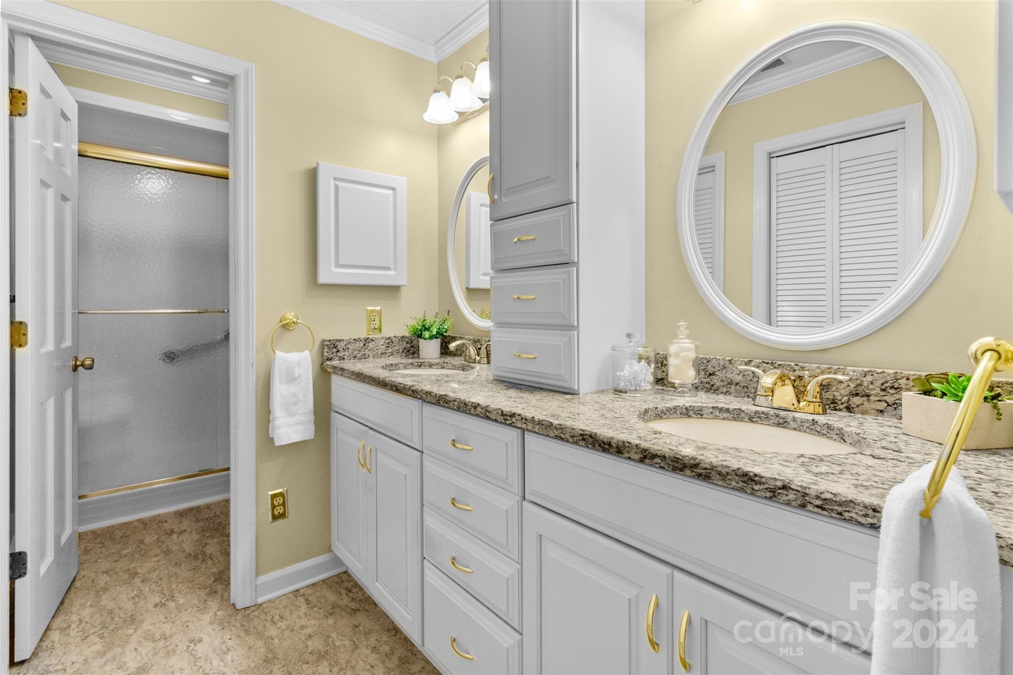 348 Beverly Circle Charlotte, NC 28270 - Photo 20 of 45 a bathroom with a granite countertop double vanity sink and a mirror