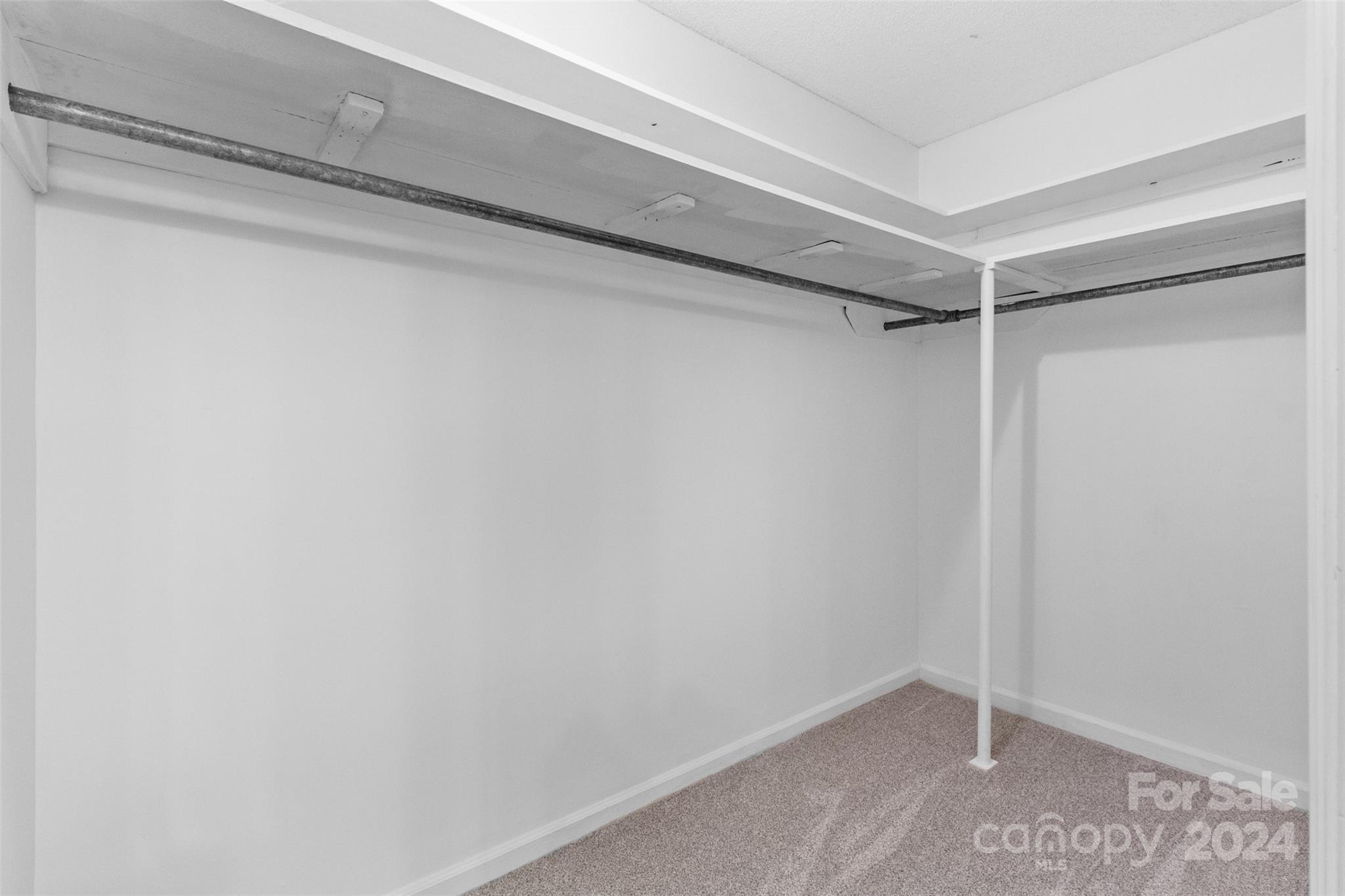 348 Beverly Circle Charlotte, NC 28270 - Photo 22 of 45 a view of an empty walk in closet