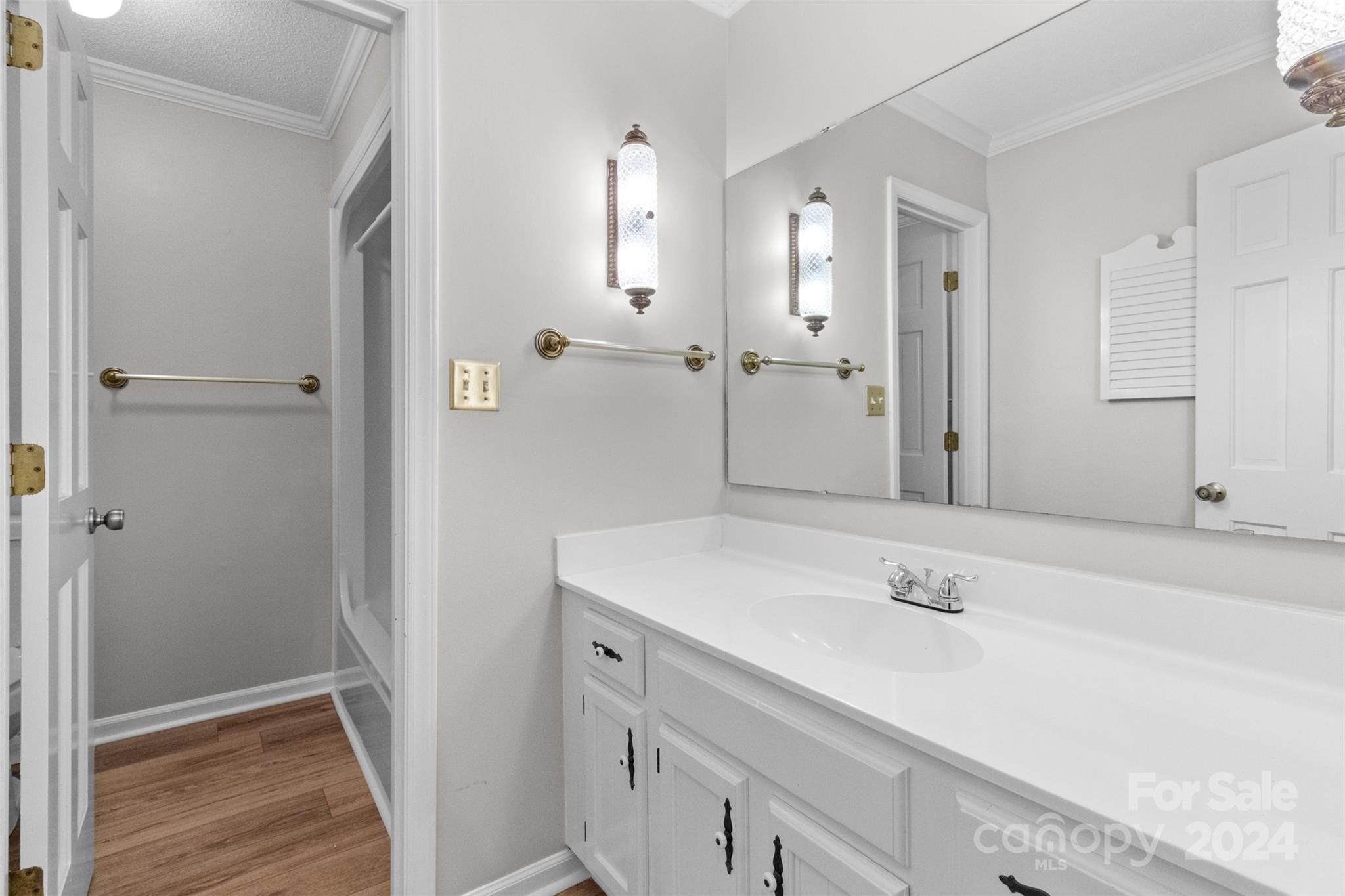 348 Beverly Circle Charlotte, NC 28270 - Photo 26 of 45 a bathroom with a sink and a mirror