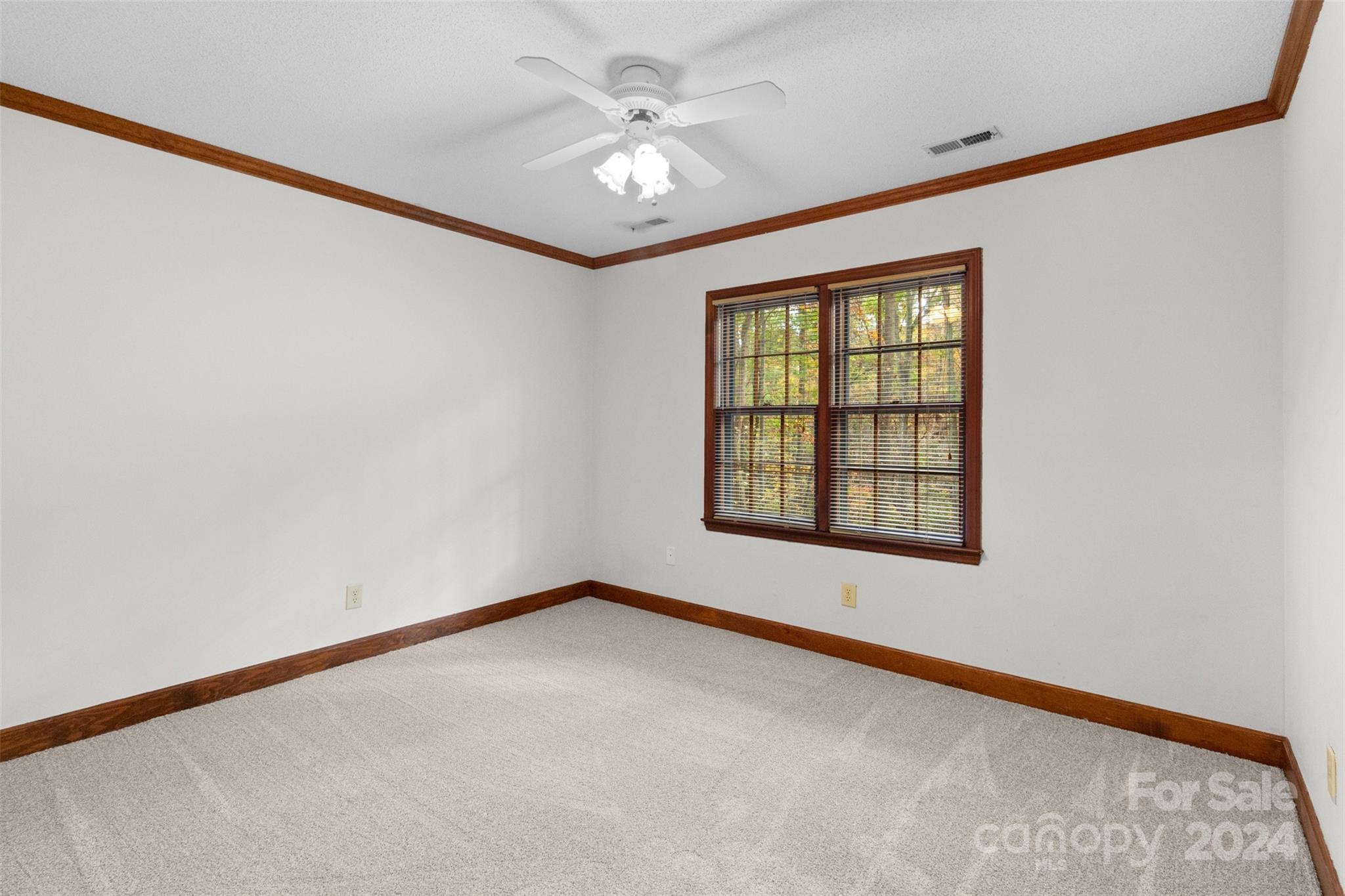 348 Beverly Circle Charlotte, NC 28270 - Photo 27 of 45 a view of an empty room with a window