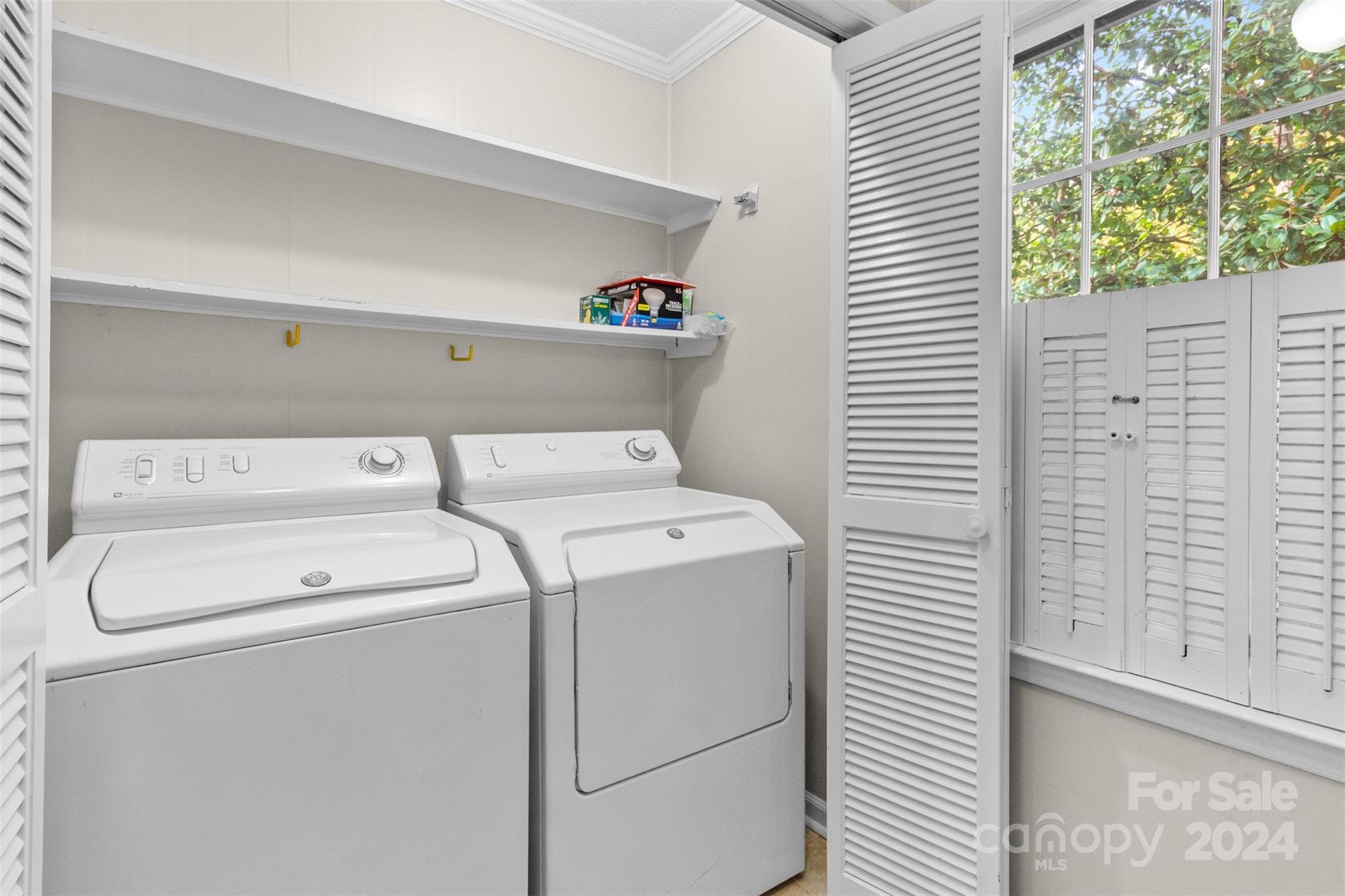 348 Beverly Circle Charlotte, NC 28270 - Photo 28 of 45 a utility room with dryer and washer