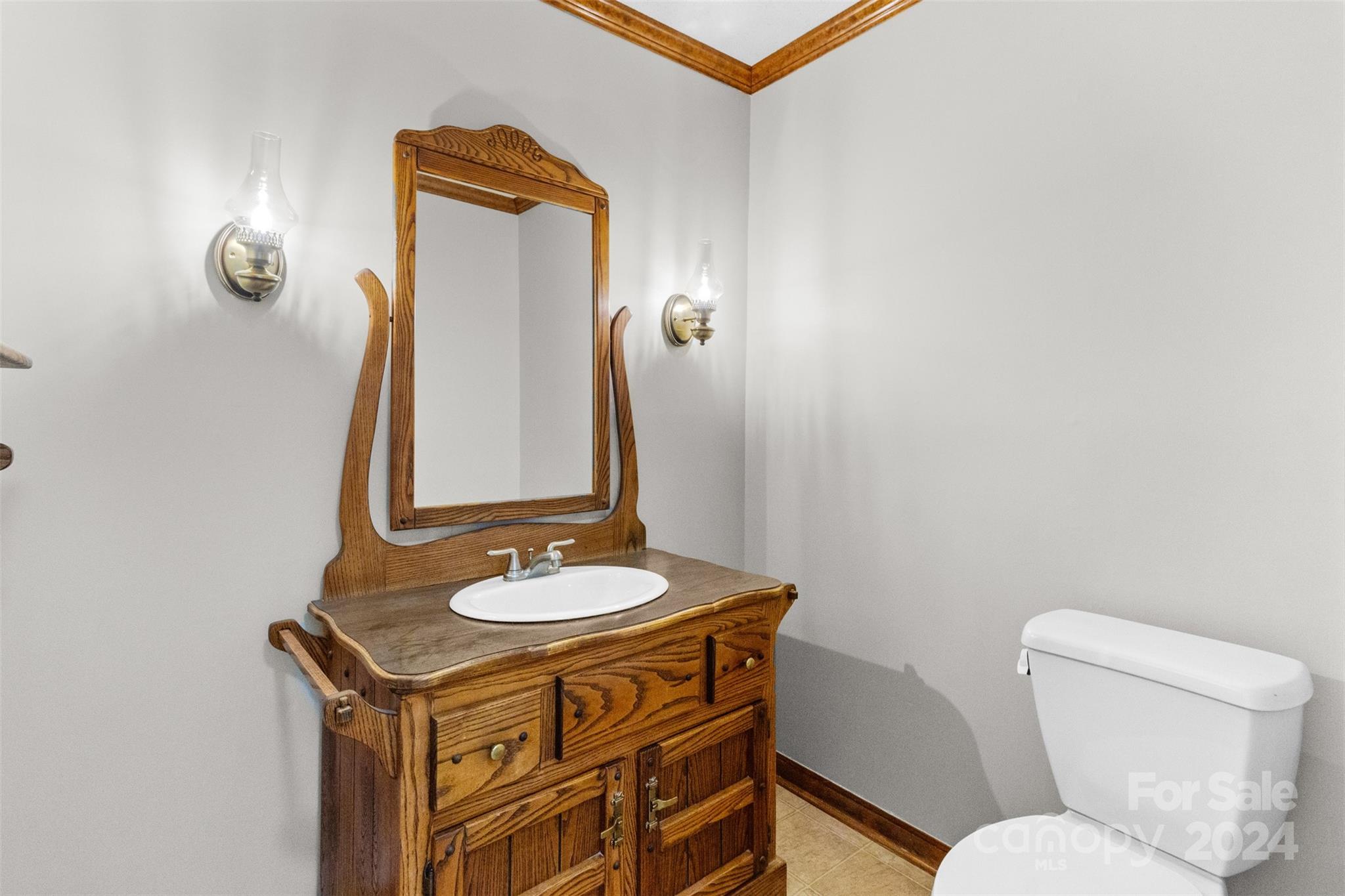 348 Beverly Circle Charlotte, NC 28270 - Photo 29 of 45 a bathroom with a sink and a mirror