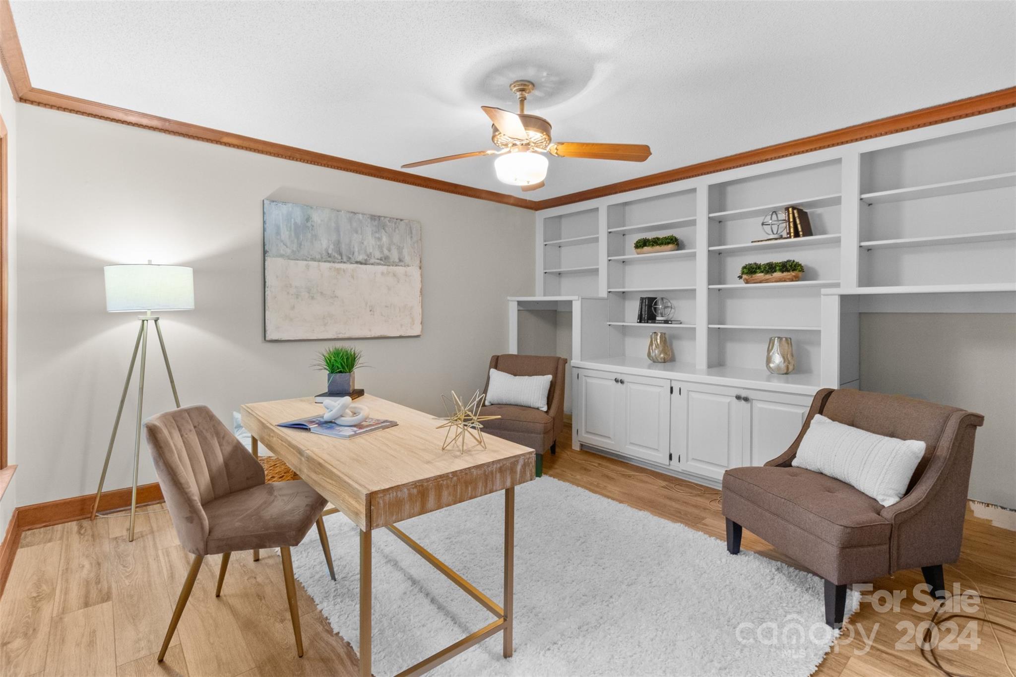 348 Beverly Circle Charlotte, NC 28270 - Photo 4 of 45 a workspace with furniture and a wooden floor