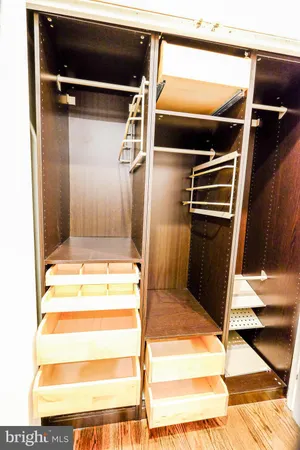 a kitchen with a refrigerator and a sink